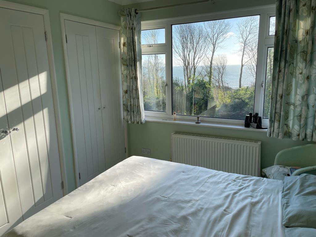 Lot: 99 - DETACHED CHALET STYLE HOME WITH SIGNIFICANT STRUCTURAL DAMAGE - Main bedroom